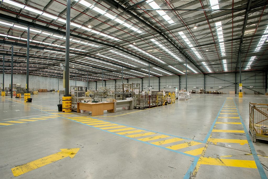 Australia Post Derrimut inside warehouse with yellow markings on floor